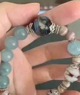 将14岁家狗骨灰烧制硫璃,她见圆珠上浑然一体的黑与白狗脸,红了眼圈…